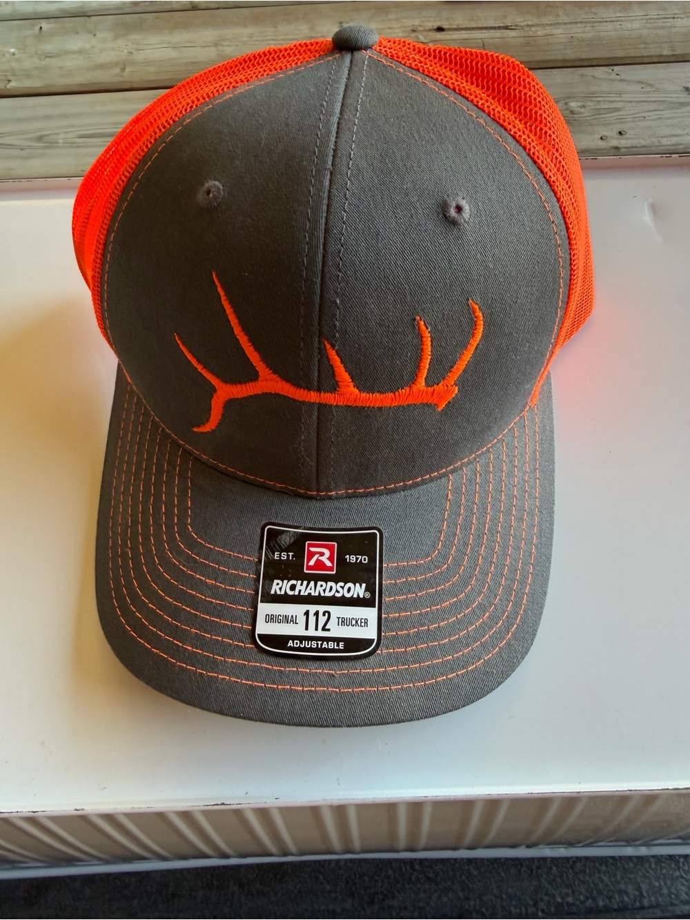 Gray & Orange Trucker Hat with Antler Logo